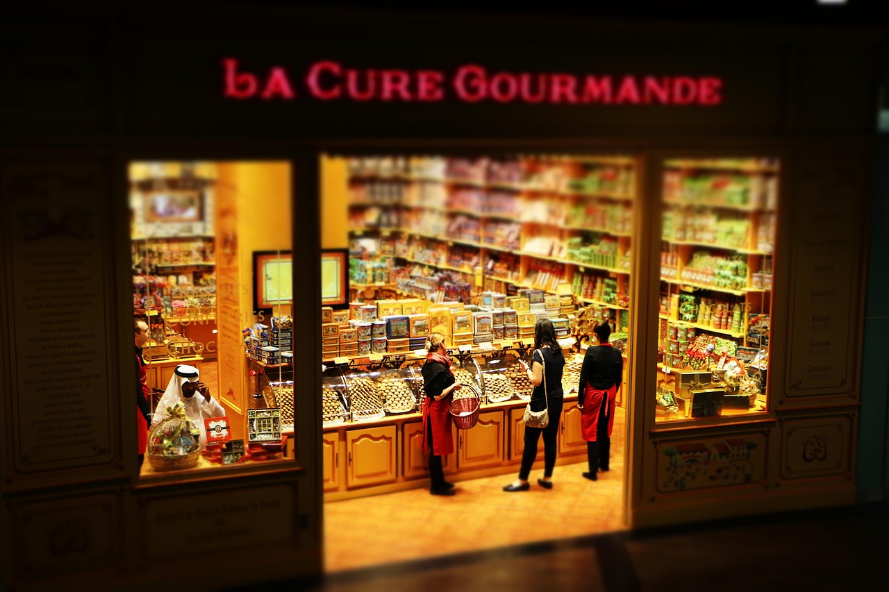 Colorful bulk disposable vape devices standing in retail display rows
